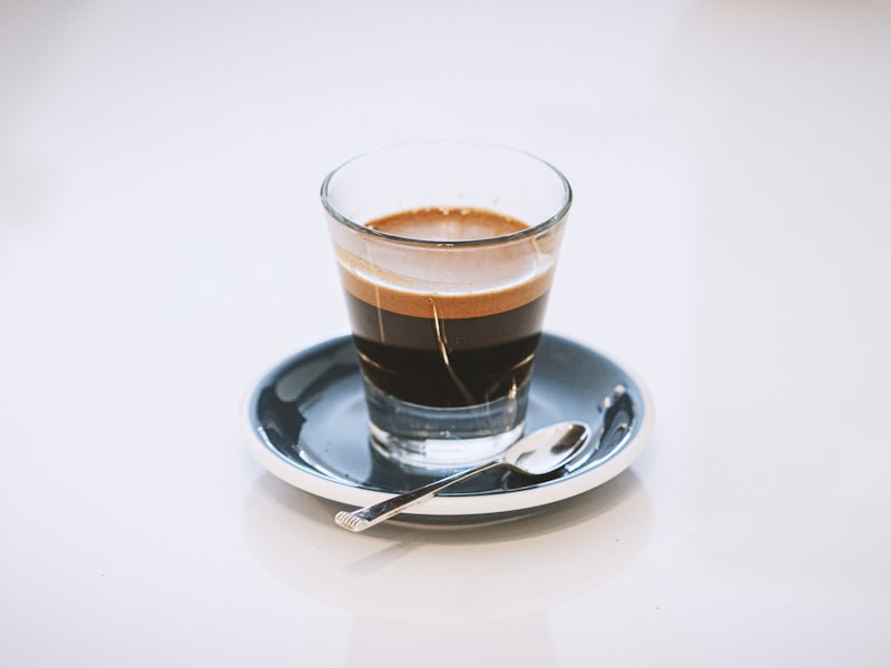 A fresh double shot of espresso in a glass